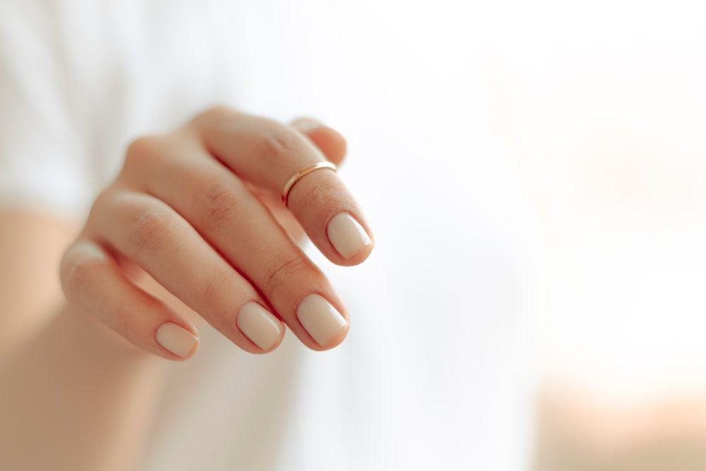 Short, neutral, glazed manicure